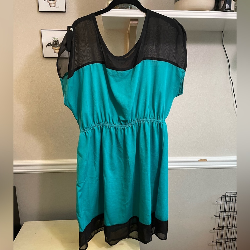 Edgy teal satin dress